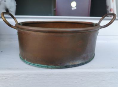 A set of old copper pots