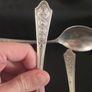 Collection of 11 Vintage Newbridge Silverware Celtic Dragon Design Spoons from Jurys Hotel Image 6