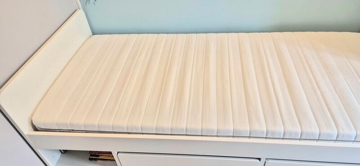 Single bed with mattress and storage