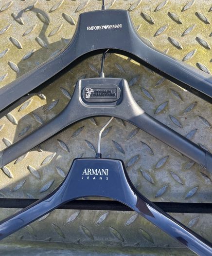 Armani Versace Hugo Boss clothes coat trousers Hangers