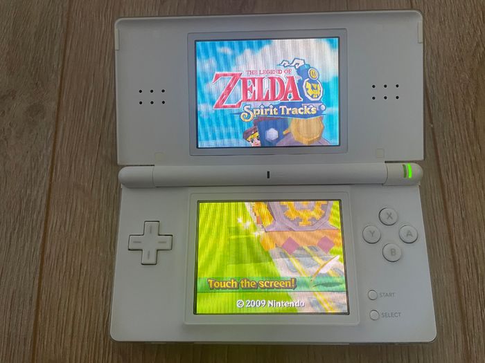 Modded Nintendo DS Lite crystal white USG 001 boxed with manual with Flash Card 32gb with Games and retro games (Neo Geo, Nes, Gameboy Color, Atari.