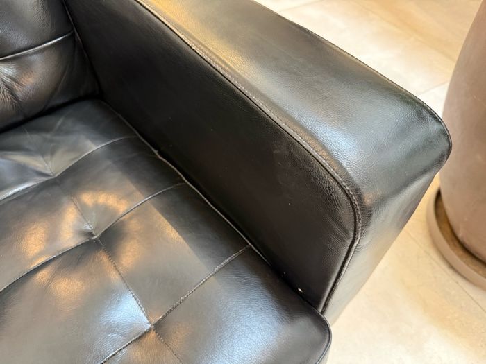 Black Leather Armchair and Matching Ottoman Footstool