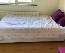 Divan bed with wheels and mattress