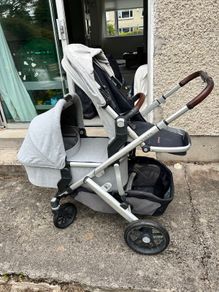UPPAbaby Vista V2 Double Stroller Bundle: Main Seat, Bassinet, Rain Covers & Adapters