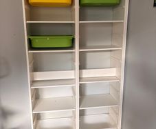 tall Trofast units with 5 shelves each  and 2-3 tubs each