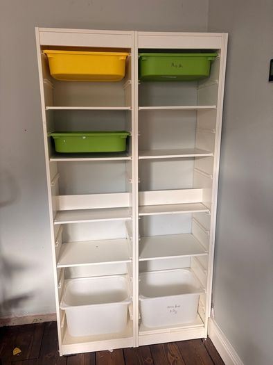 tall Trofast units with 5 shelves each  and 2-3 tubs each