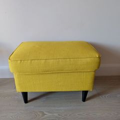 Yellow IKEA footstool strandmon