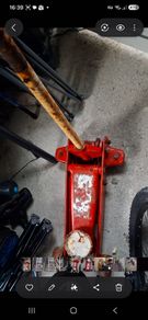 Red hydraulic trolley jack