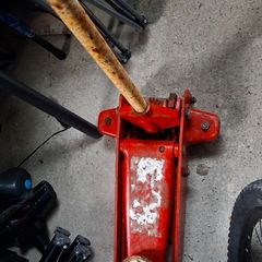 Red hydraulic trolley jack