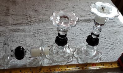 three glass with black candle holder