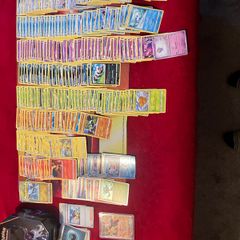 Pokemon large Sized Storage Tin and 250 cards and 2 v/ex cards