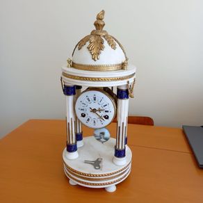 Antique pendulum marble clock.