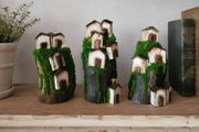 Handcrafted wooden houses on logs!