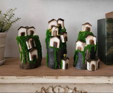 Handcrafted wooden houses on logs!