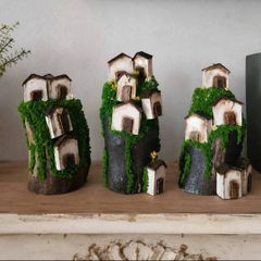 Handcrafted wooden houses on logs!