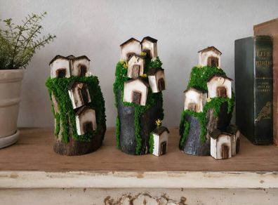 Handcrafted wooden houses on logs!