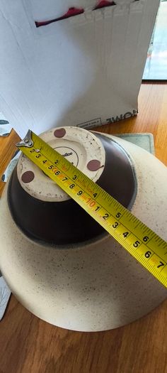 Large Angular Beige speckled ceramic bowl with a wide conical flare and a dark brawn contrasting base By Paul Costelloe.