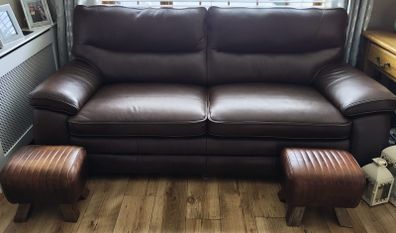 leather sofa plus footstools. 1 year old