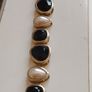 A beautiful gold-tone bracelet. Image 4