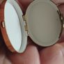 A vintage metal pill box with an enamel lid. Image 4