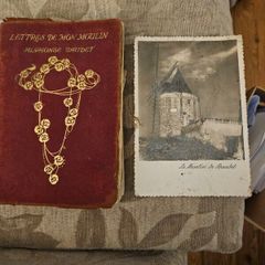 Letters De Mon Moulin By Alphonse Daudet. Plus Vintage Postcard Of The Mill. Vintage Hardback In Fair Condition.  See Photos For Same.
