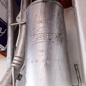 Original Nissan Micra exhaust.