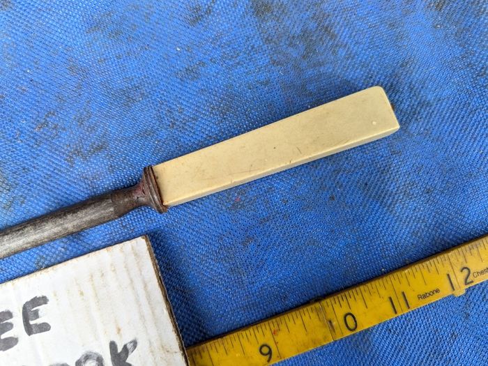 Chefs Steel with bone handle.