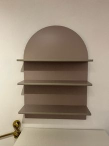 Beige arched wall shelf