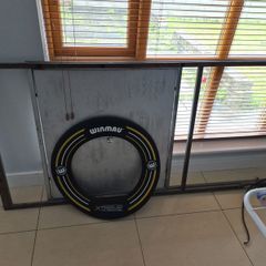 Darts stand and board and surround
