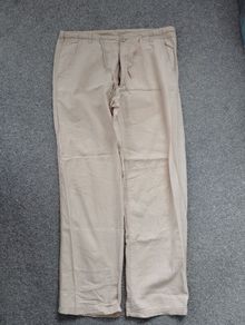 mens light trousers.medium size