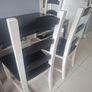Black Glass Table And 4 Black And White Wooden Chairs Image 3