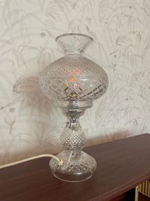 Elegant vintage cut glass electric table lamp in a classic hurricane