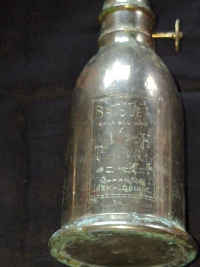 Antique French Lampe-Briquet lighter lamp manufactured by the brand TH. It is described as Sans Soudure The inscription Inexplosible indicates it was marketed as a safety product, often dating from before 1900s