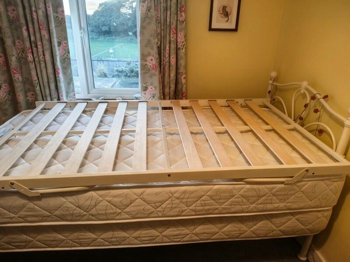 Single bed with pullout bed underneath