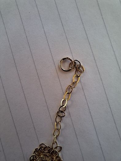 Gold pendant & chain  2 .92 grams                          2.82 grams