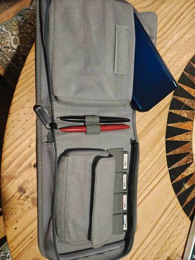 Nintendo 3ds xl with 24  games and pouch and pens