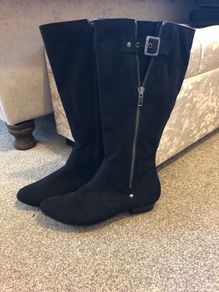 Tall black boots