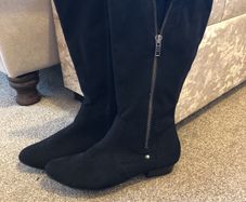 Tall black boots
