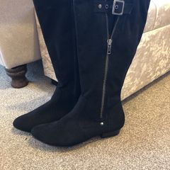 Tall black boots