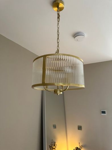 Brass and ribbed glass pendant light fitting