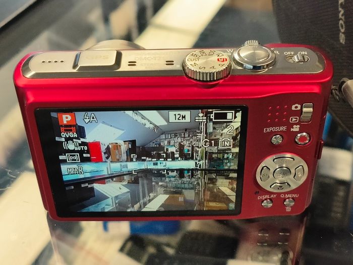 Panasonic LUMIX DMC-TZ10 12.1MP Digital Camera 12x Optical Zoom Red/ Excellent