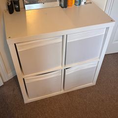 Shelf including storage boxes