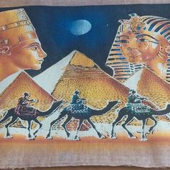 Hand-painted artwork on tree bark, originally from Egypt.