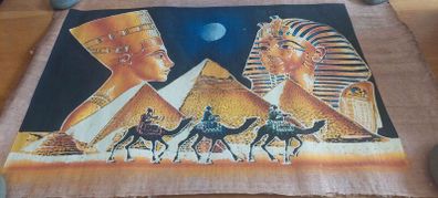 Hand-painted artwork on tree bark, originally from Egypt.