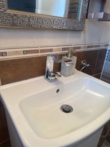 Waved mixer tap