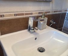 Waved mixer tap