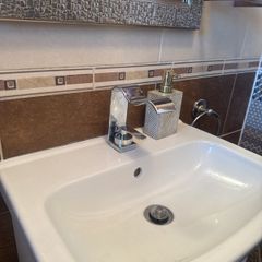 Waved mixer tap