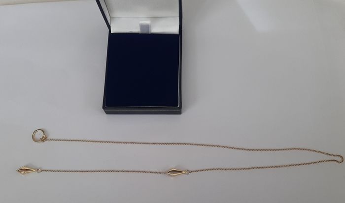 New 10kt gold pendant and chain