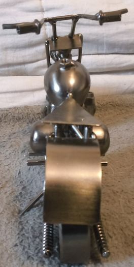 White metal made motor bike