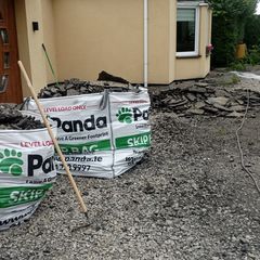 Four bags of broken tarmac/asphalt